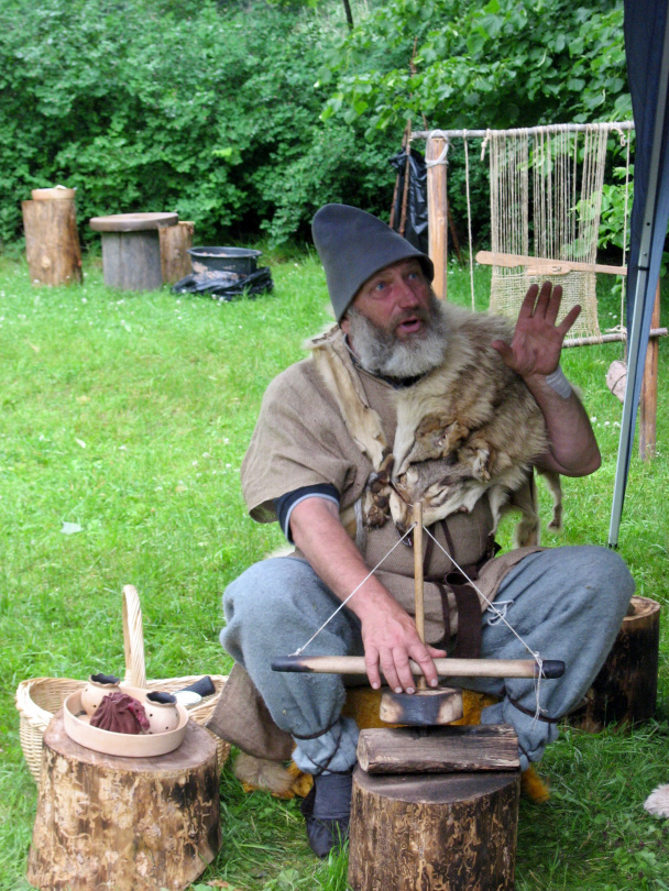 Making a fire in medieval fair in Pärnu