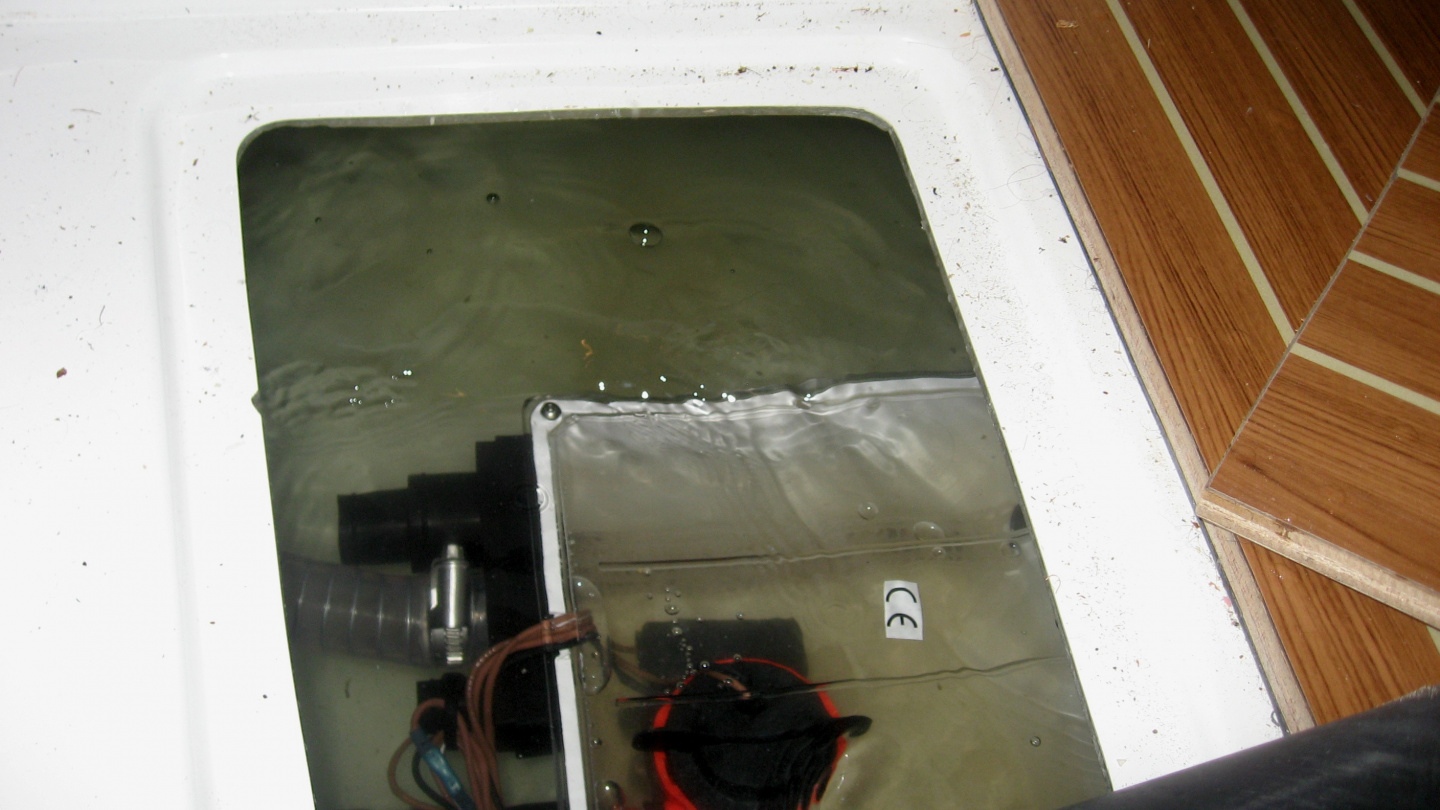 Water under bow cabin floorboard