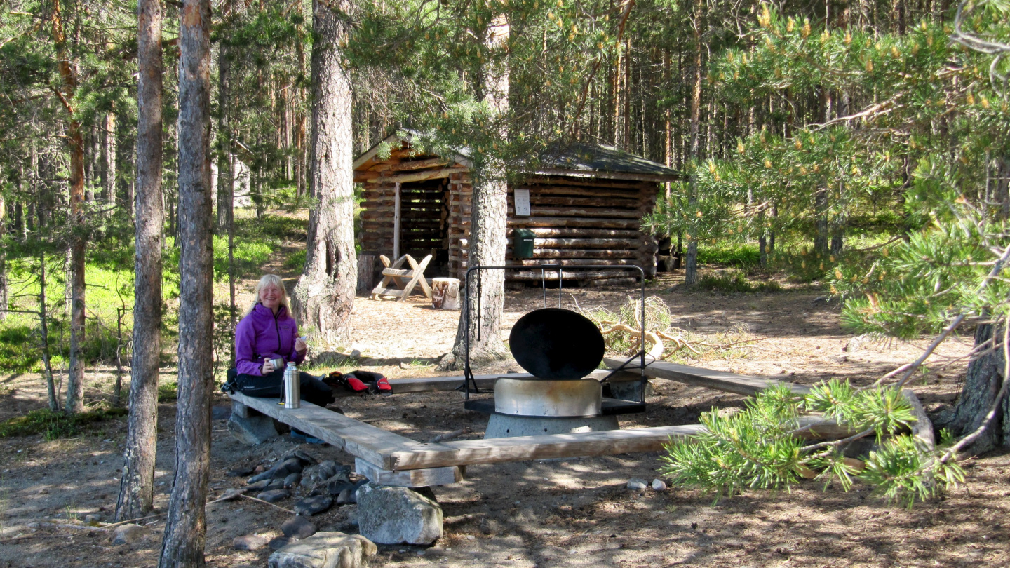 Eve at the fireplace of Hietasaari