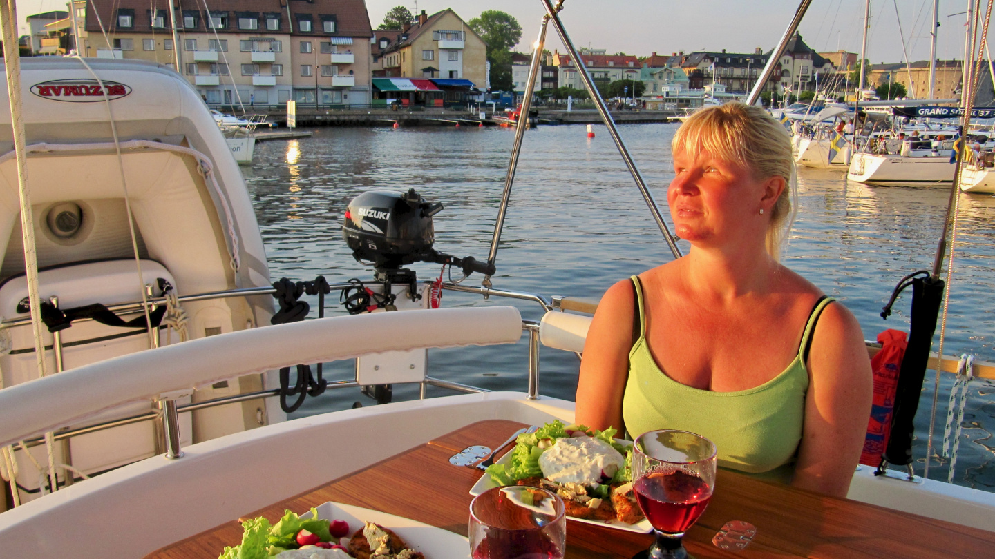 Eve enjoying dinner in Suwena's cockpit in Vaxholm