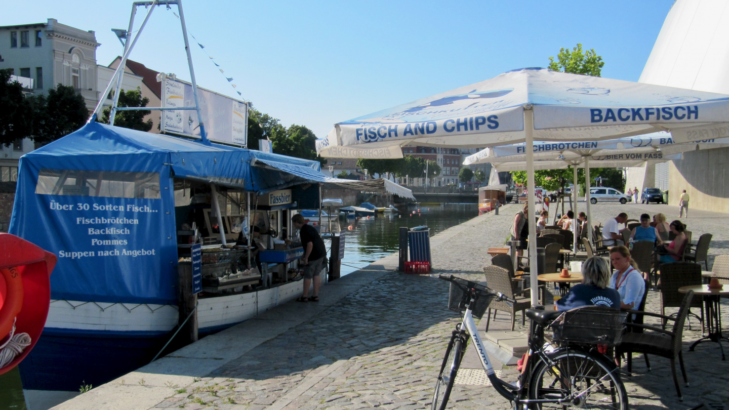 Fresh smoked fish are sold directly from smokery boat in Stralsund