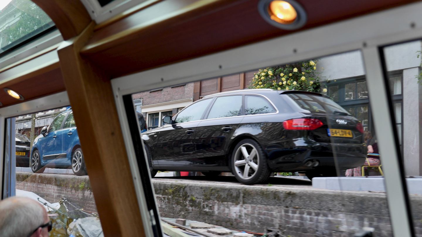 Narrow parking spot by the canal of Amsterdam