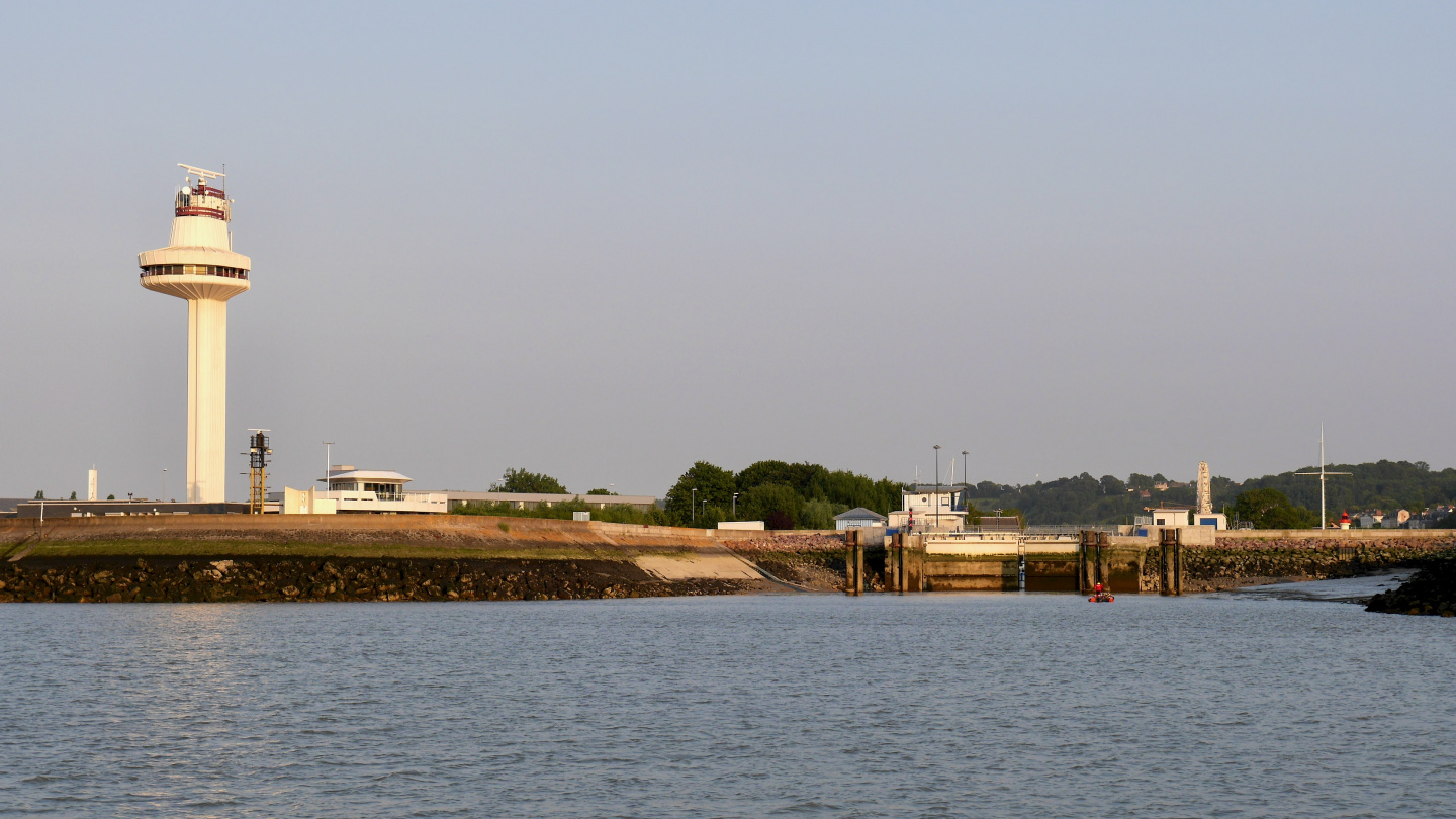 VTS tower and the entrance to Honfleur lock on the river Seine