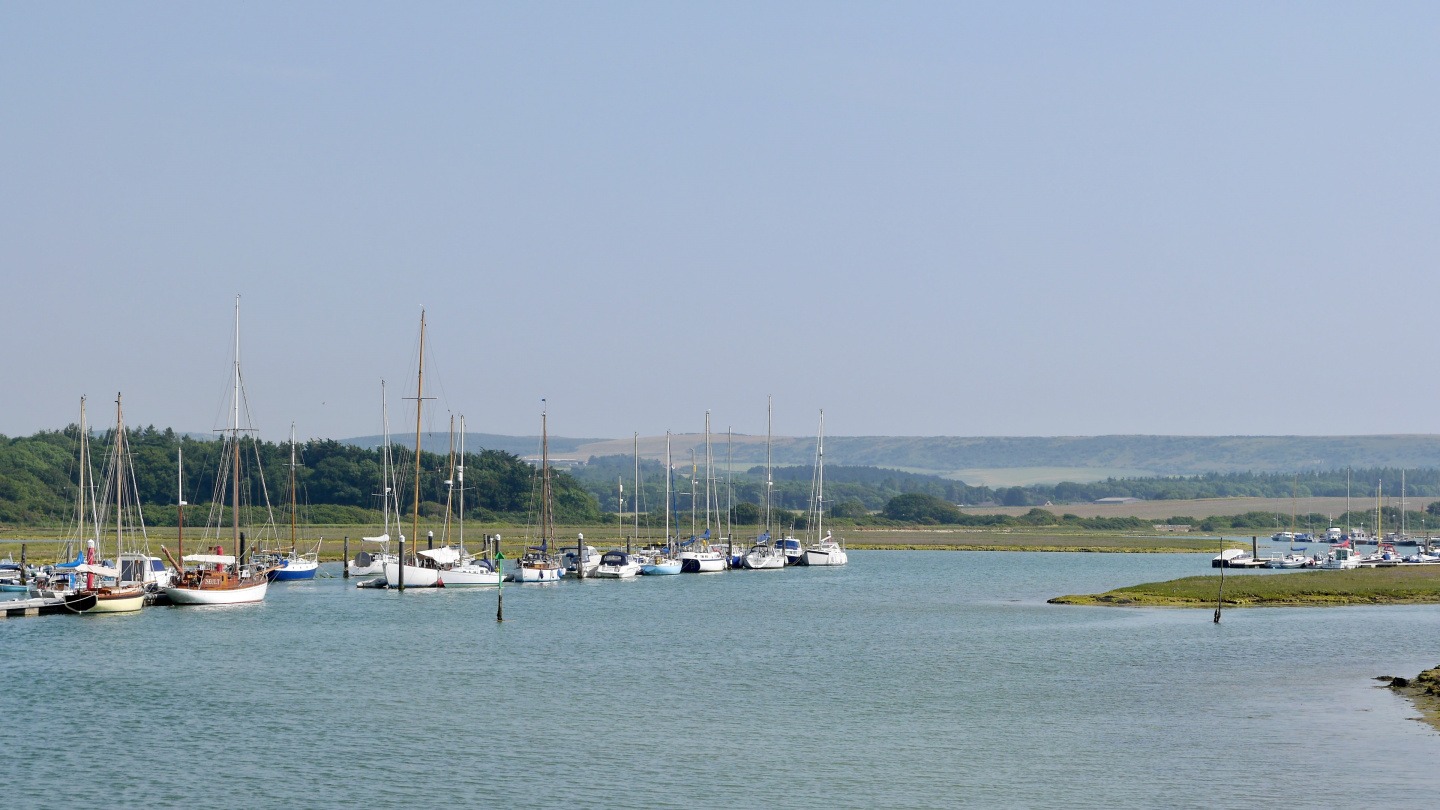 Local yachts moored on the river Yar on the Isle of Wight