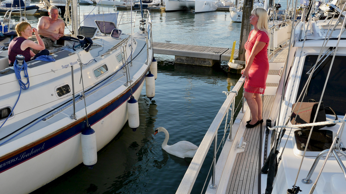 Eve getting sailing tips in the Port Hamble Marina