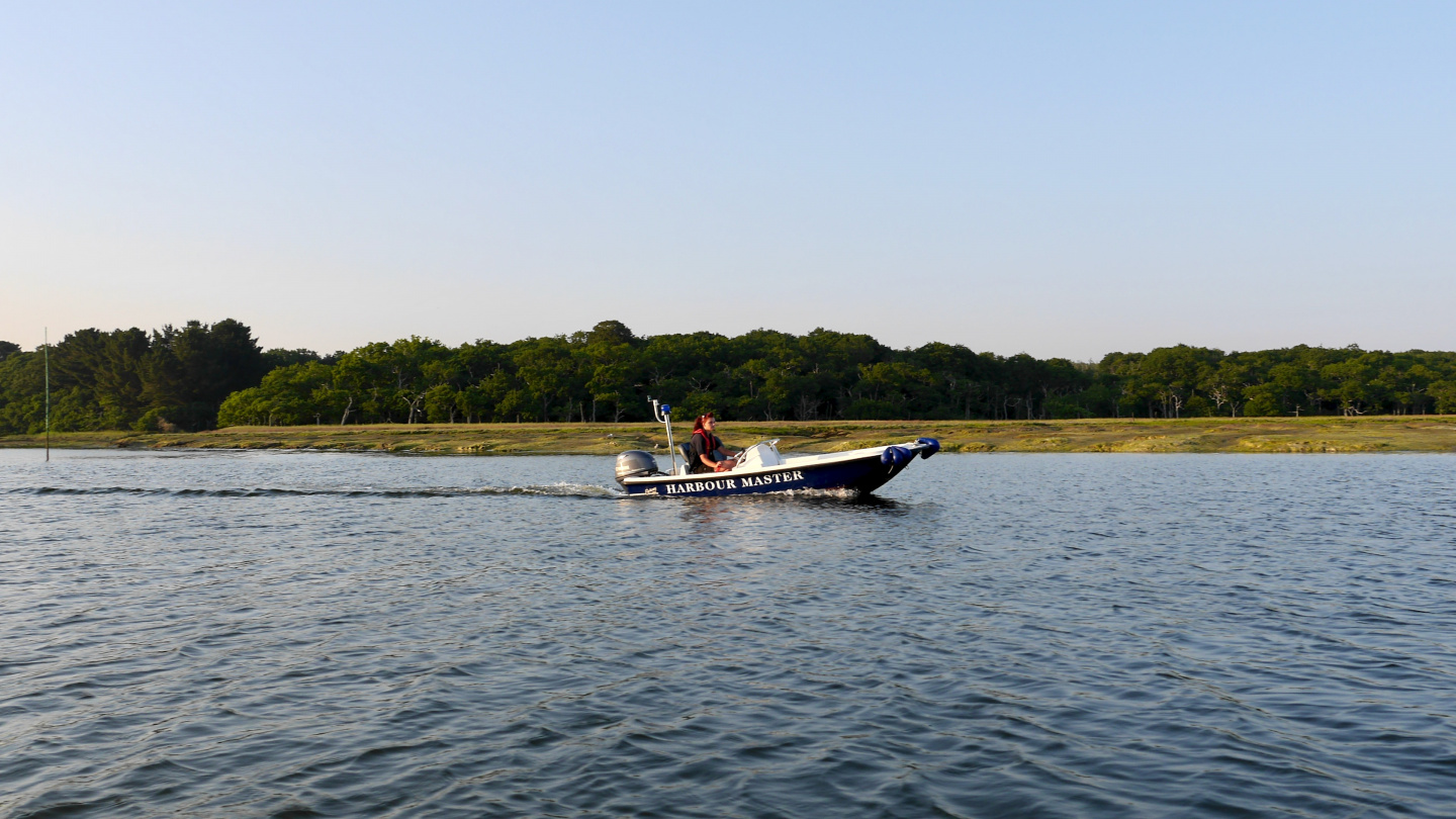 Harbour girl of the Buckler's Hard marina meeting the yachtsmen