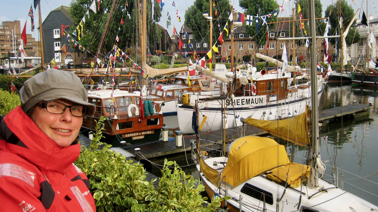 Tuovi looking at boats in the St Katharine Docks marina in London