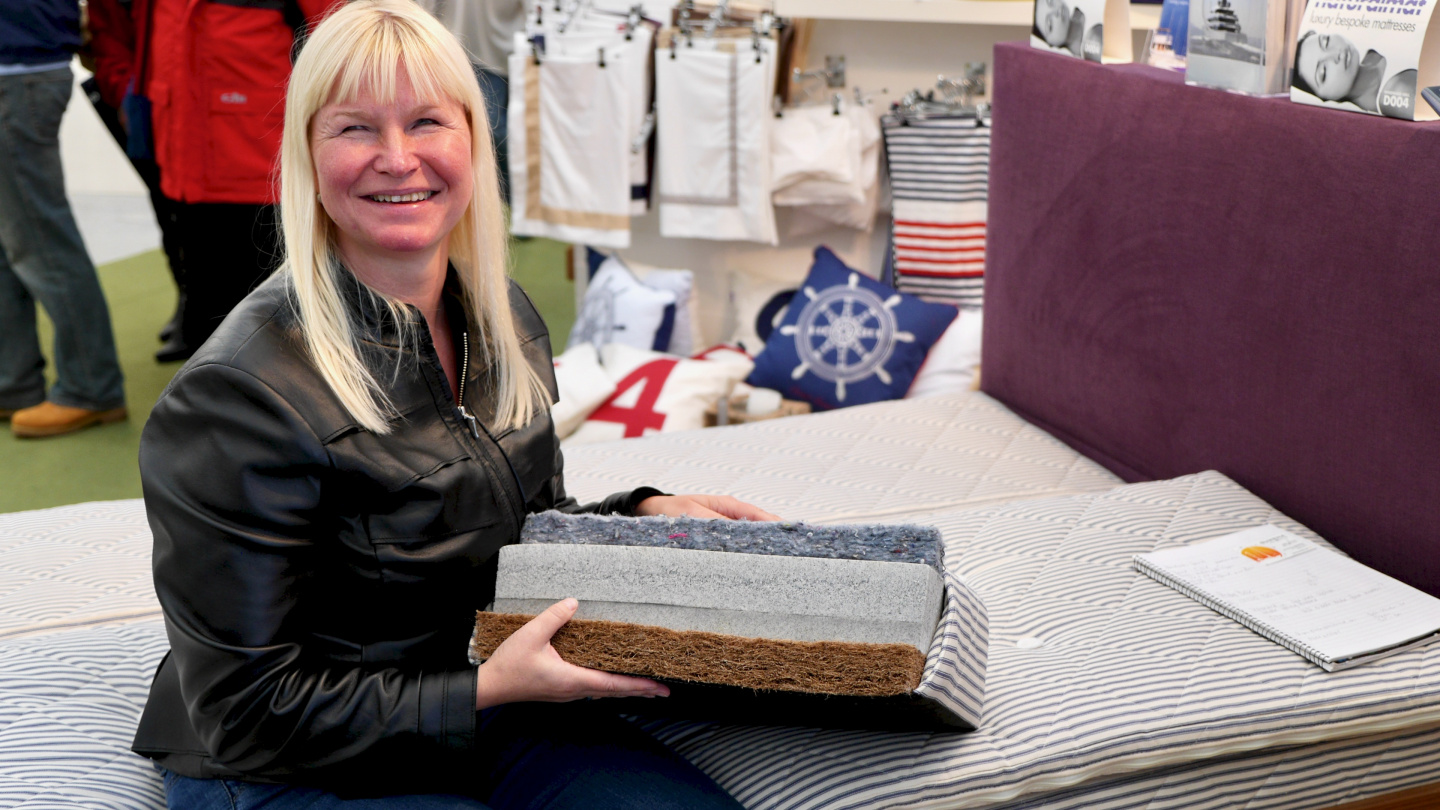 Eve is examining the Naturalmat's mattress