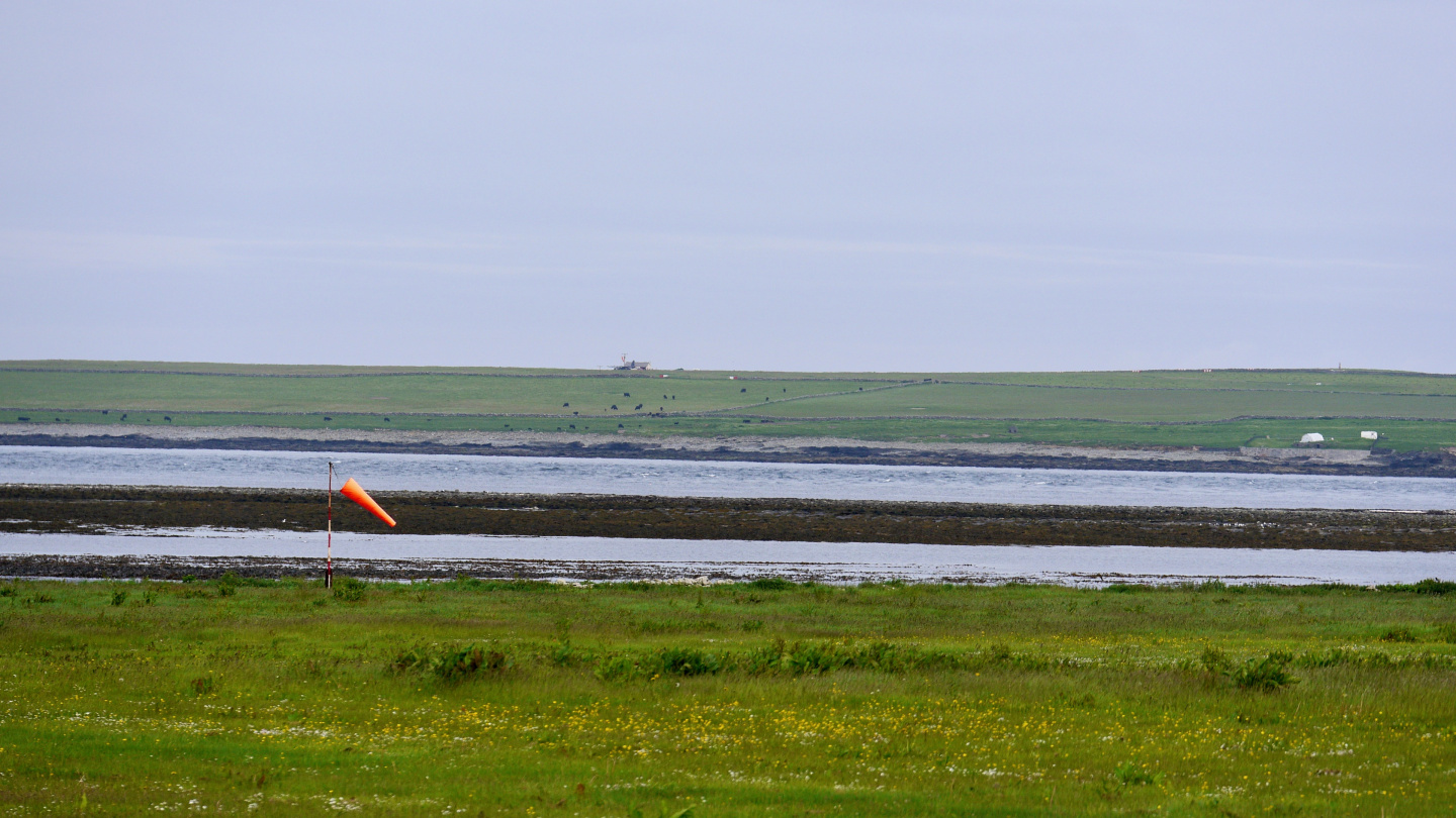 Airport of Papa Westray as seen from the airport of Westray