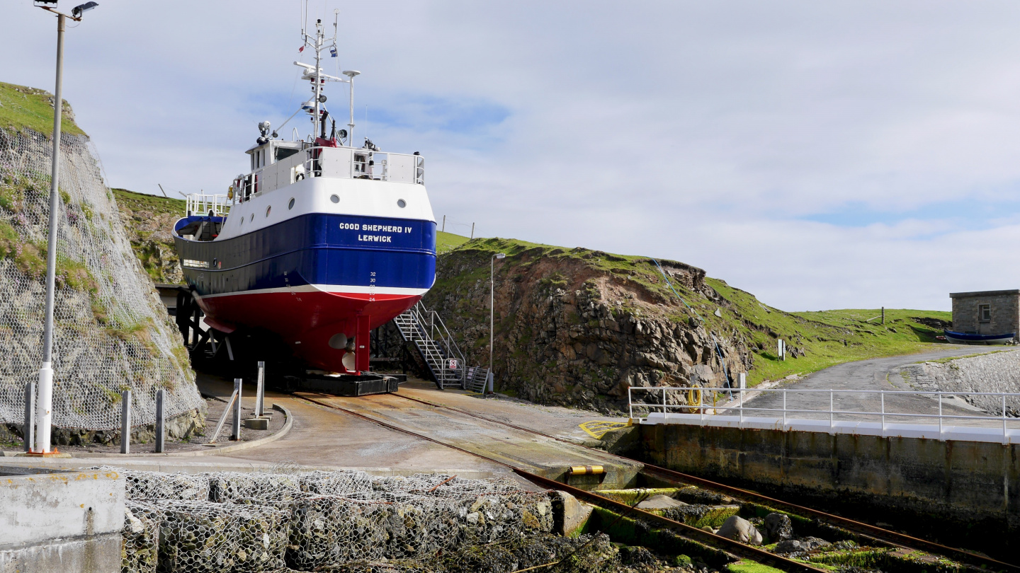 Fair Isle - Shetland ferry in the cliff garage