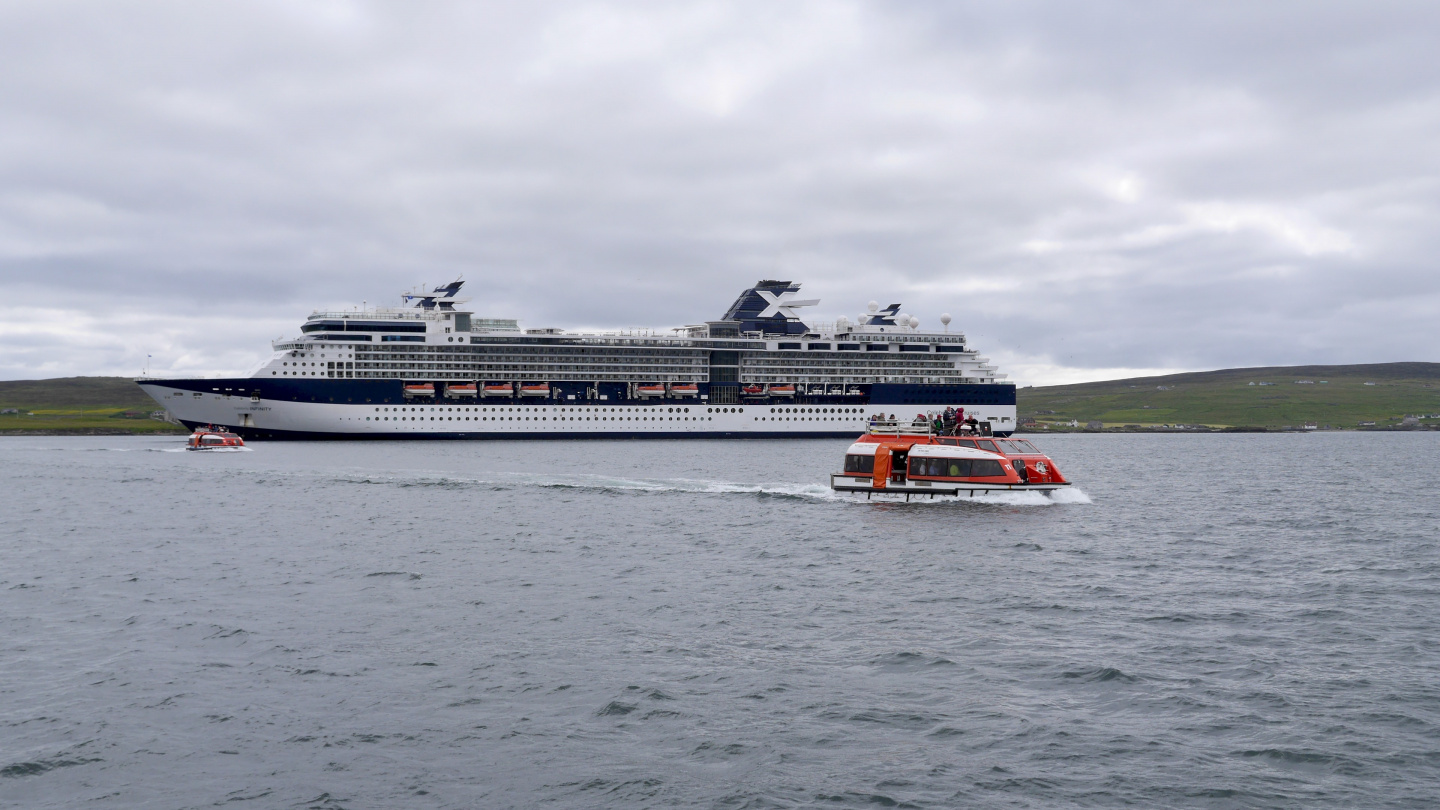 Passengers of Celebrity Cruise are tendered to the town of Lerwick