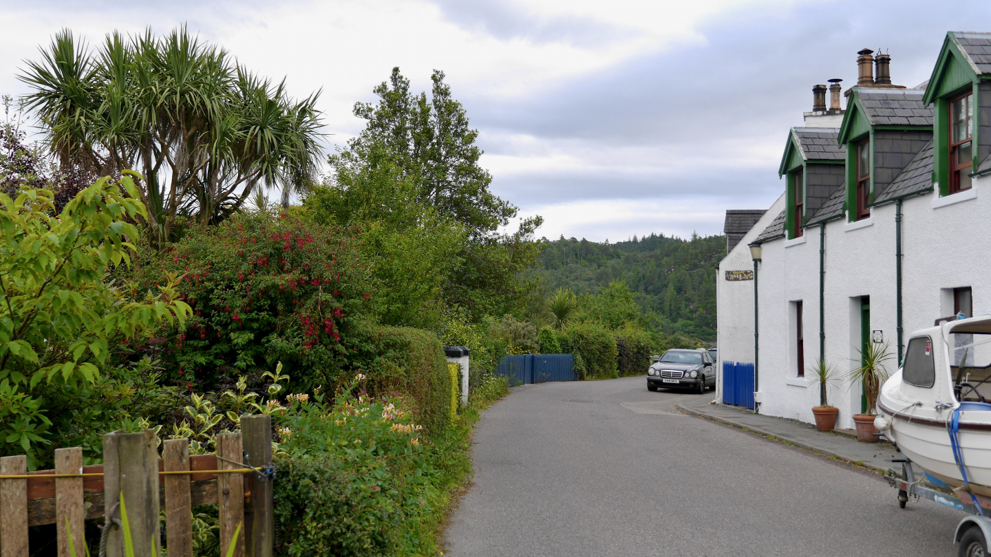 Lush Harbour street in Plockton in Scotland