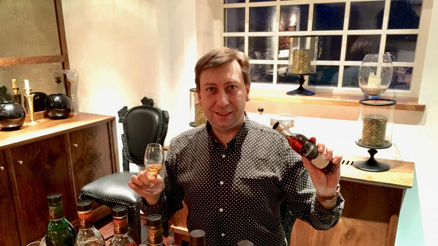 Andrus tasting whiskey at Glenfiddich distillery