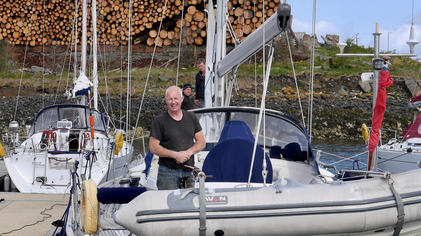 Hugh and Neil working on a boat in Troon