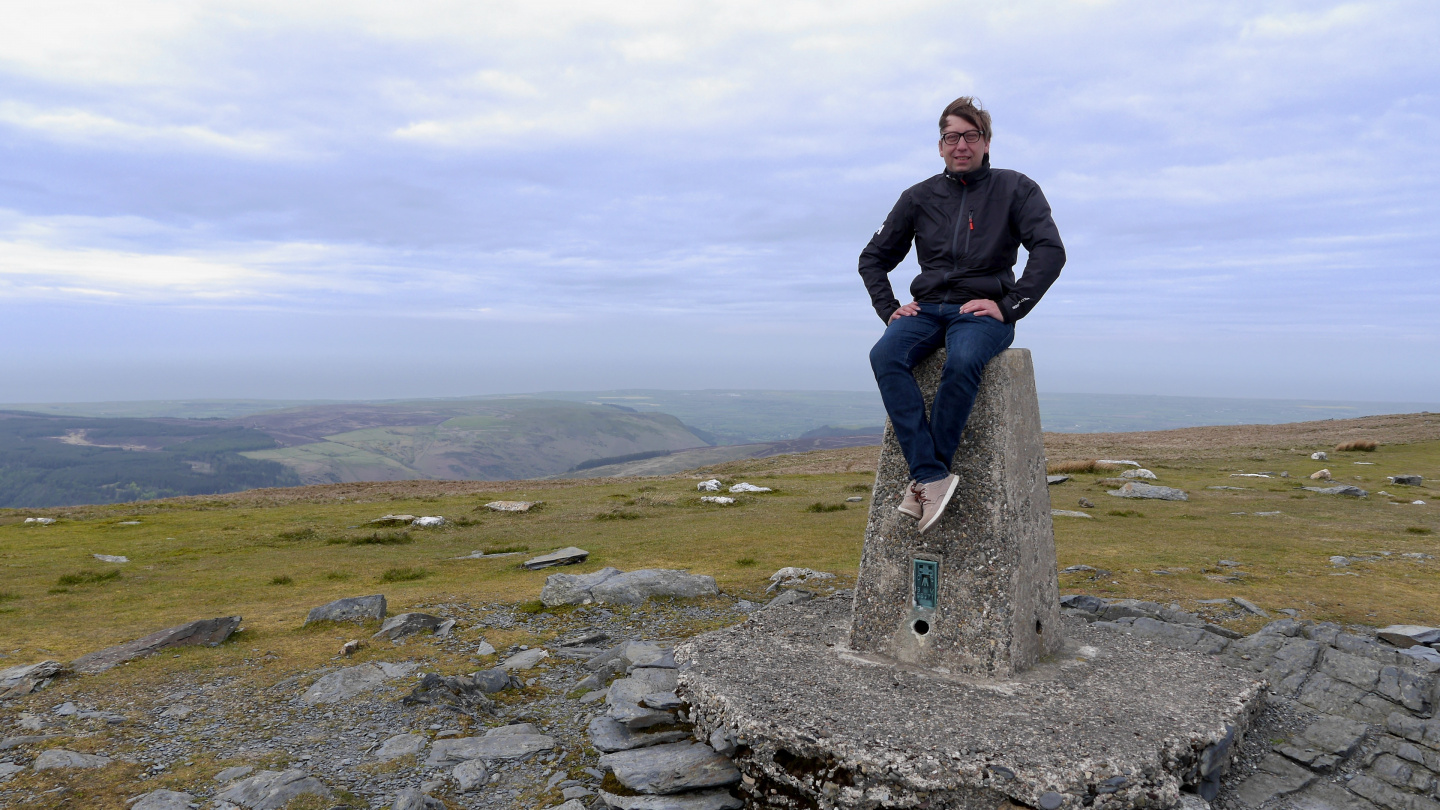 Andrus at the top of Snaefell mountain on the Isle of Man