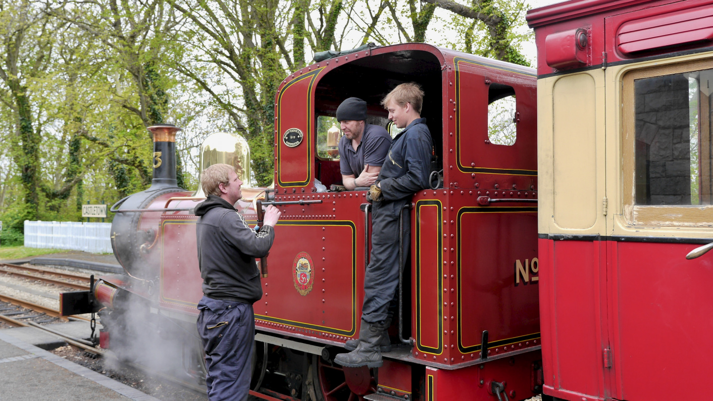 Drivers of the steam locomotive at the break on the Isle of Man