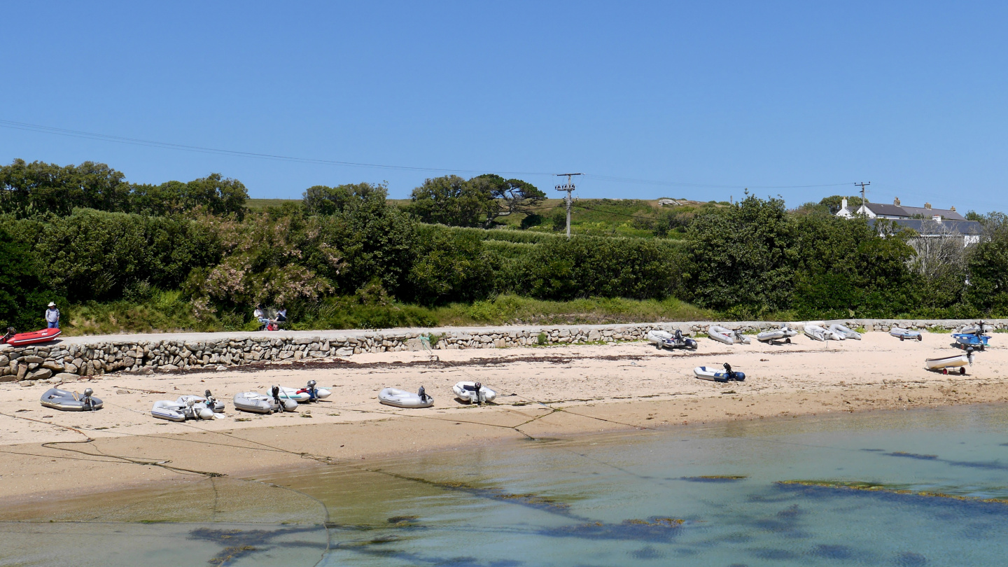 Dinghies on the beach at New Grimsby village on the Isles of Scilly