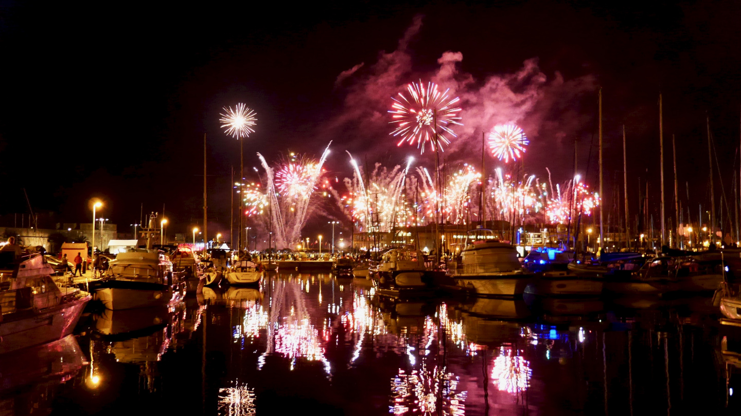 Fireworks of French national day in Bassin Vauban marina in St Malo