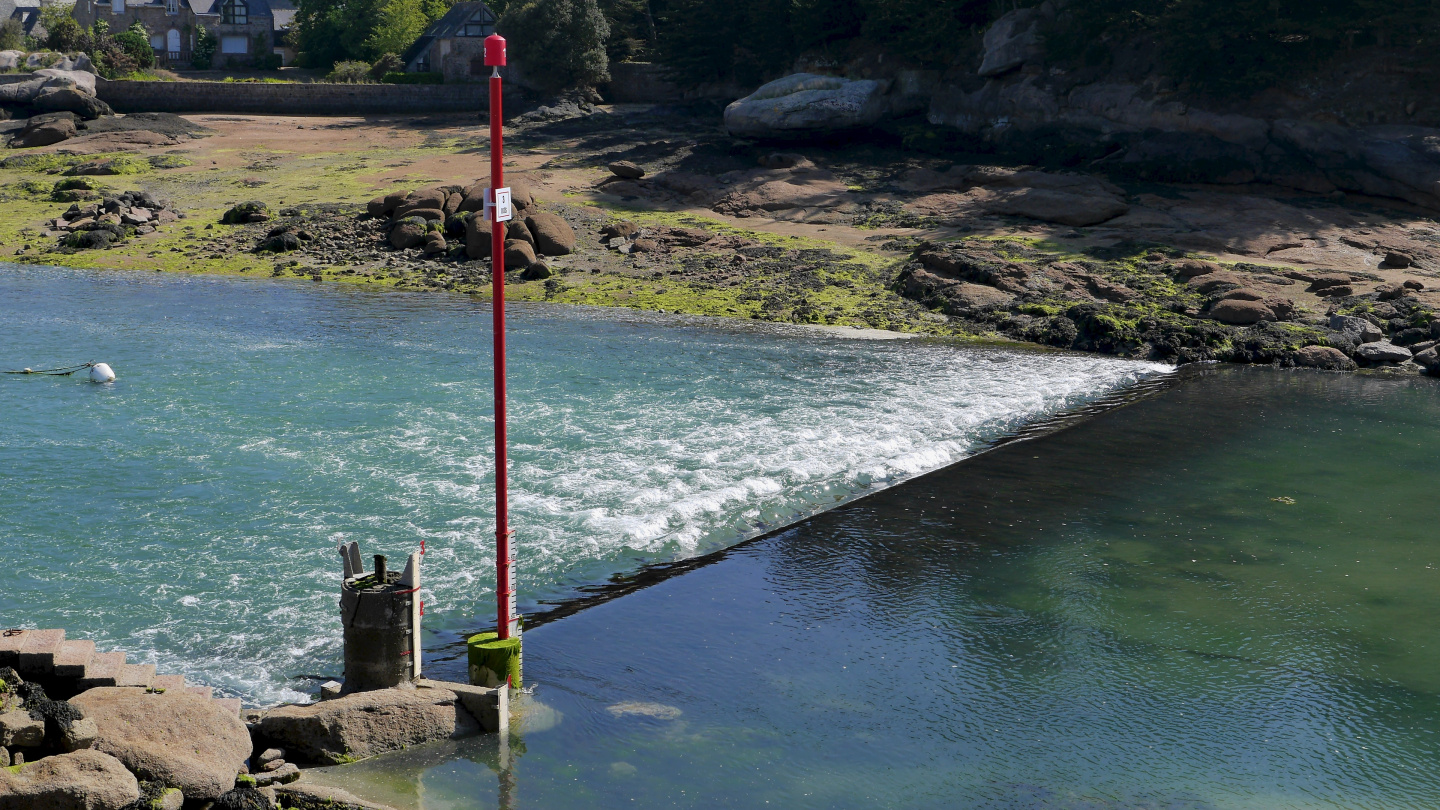 Tidewater pouring into the lagoon of Ploumanac'h in Brittany