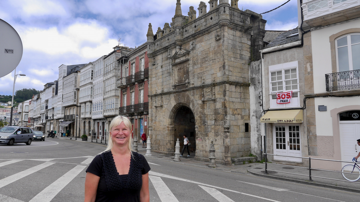 Eve at Carlos V gate in Viveiro in Spain