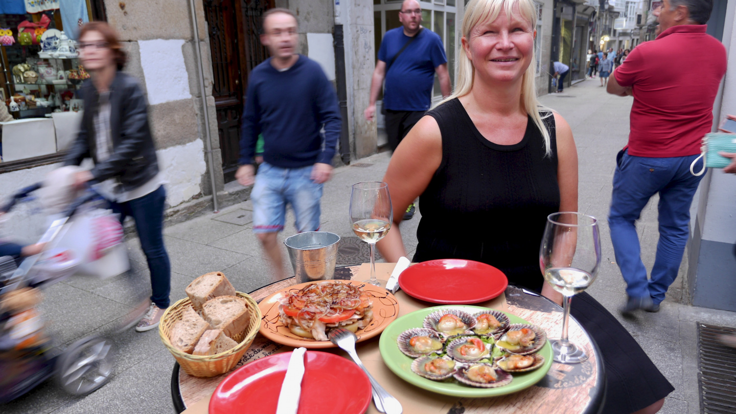 Eve having galician dinner in Viveiro in Spain