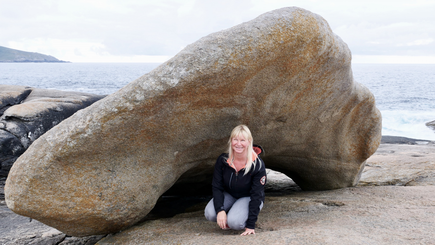 Eve under Pedra da Barca stone in Muxia, Galicia