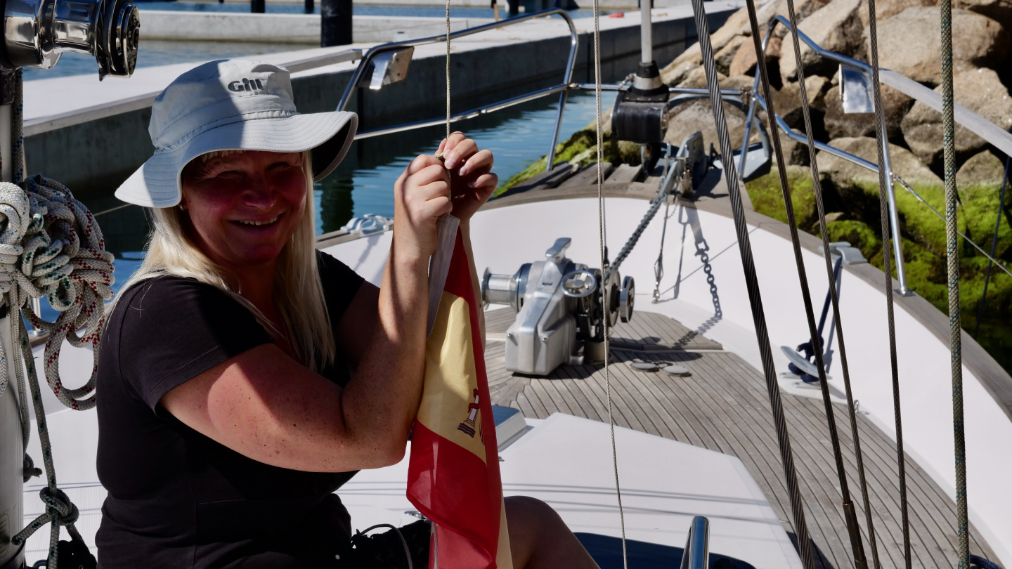 Hoisting of Spanish courtesy flag in Xufre boatyard, Galicia