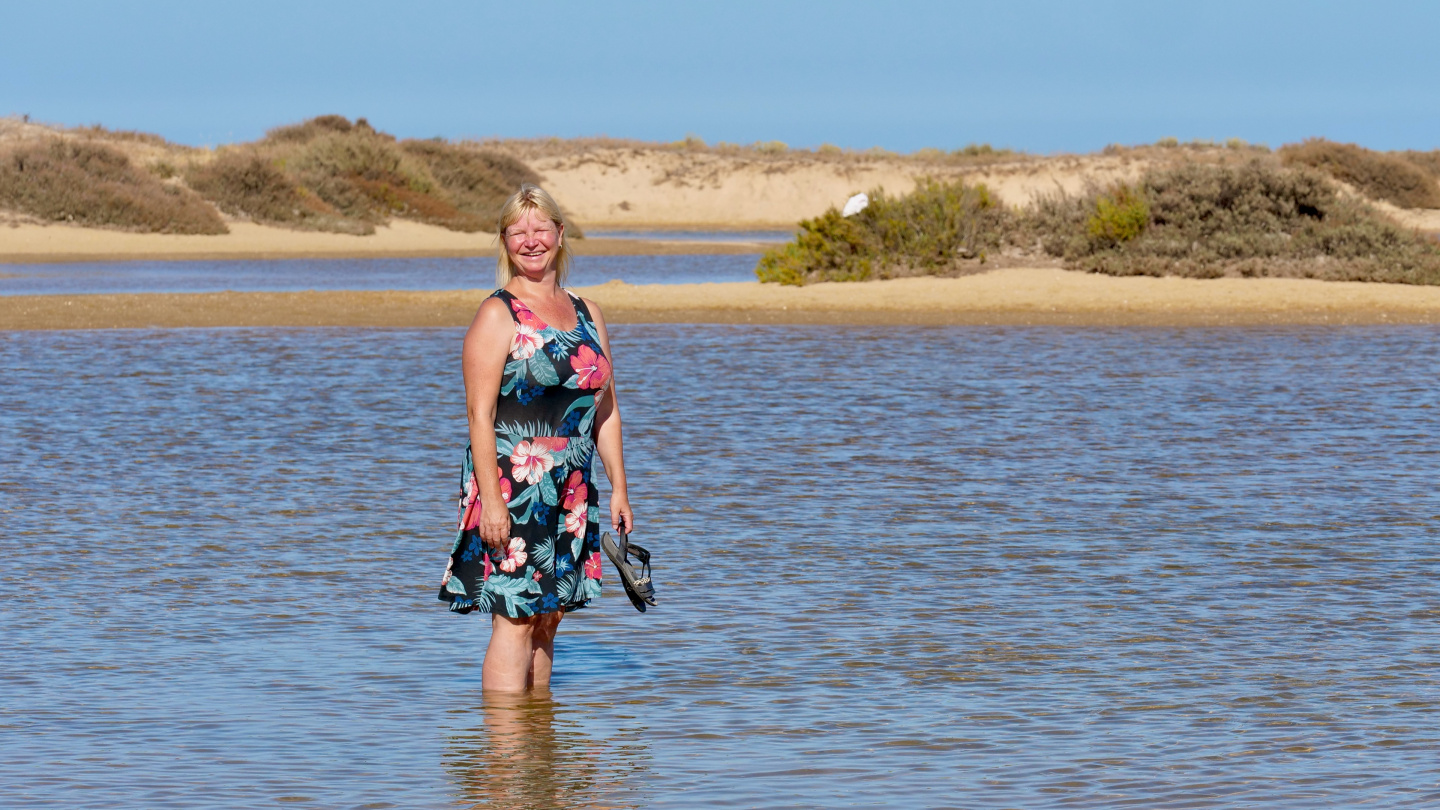 Eve in the secret lagoon of Culatra, Algarve