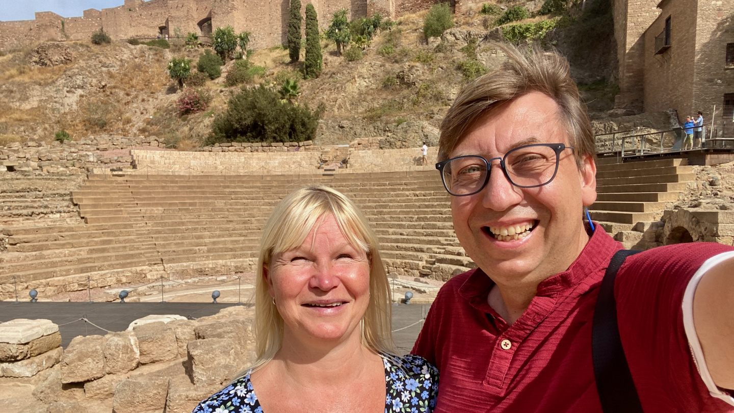 Eve and Andrus at Roman amphitheatre in Málaga, Spain
