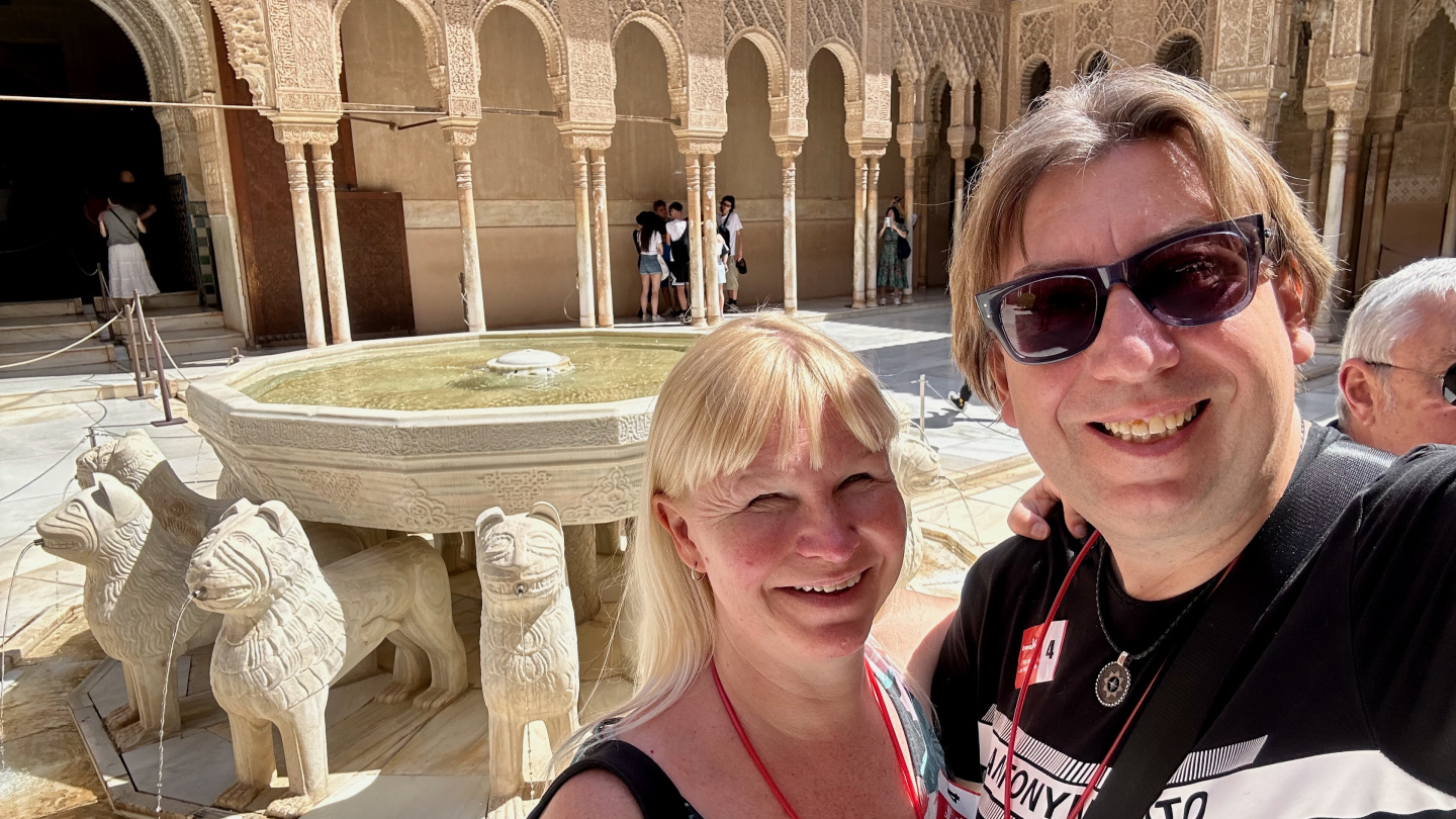 Eve and Andrus in the Court of the Lions in Nasrid Palace, Alhambra, Granada, Spain